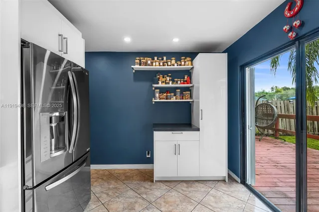 a view of a kitchen with washer and dryer