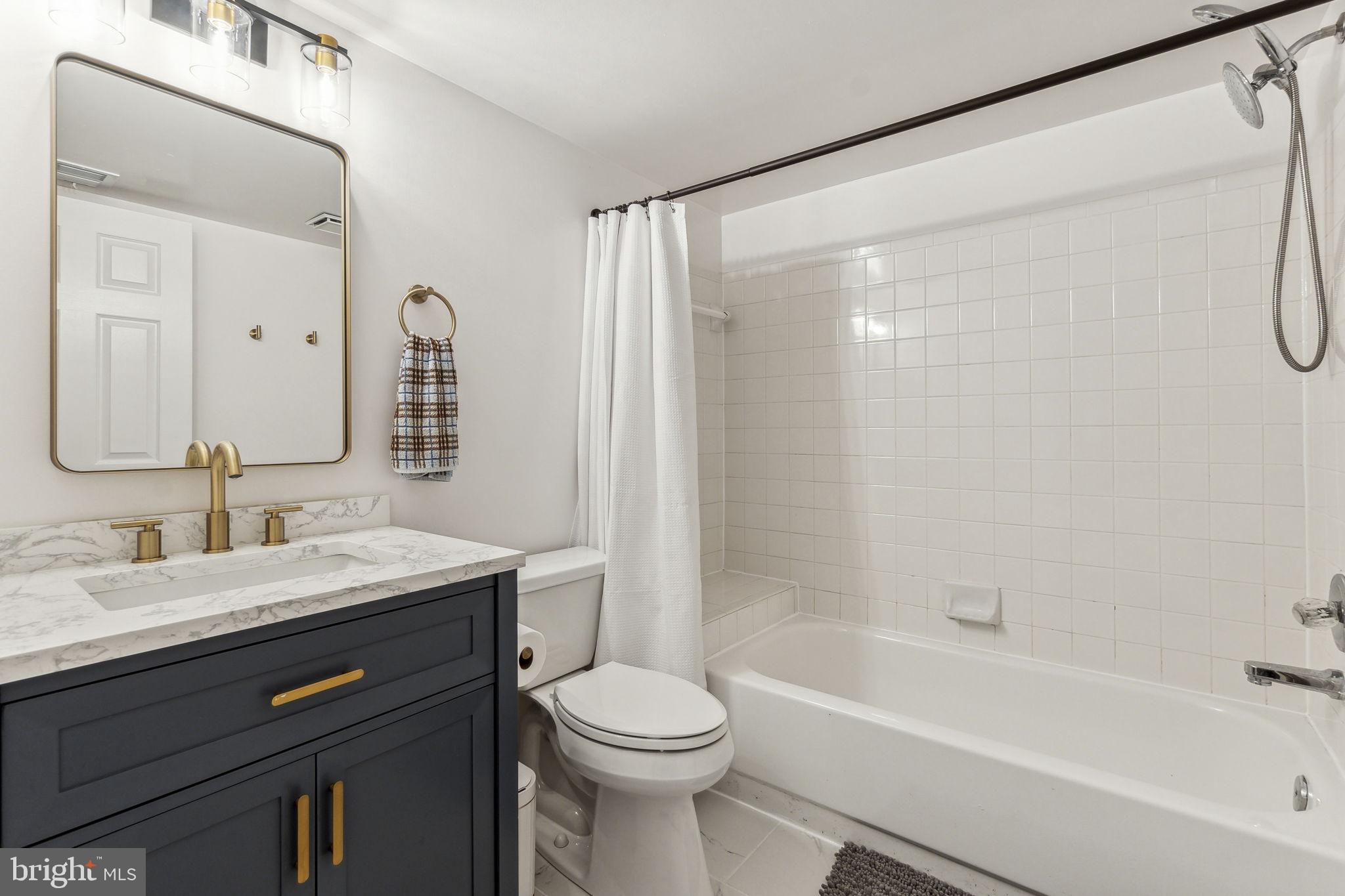 9212 Vanfleet Court Laurel, MD 20708 - Photo 9 of 46 Entry level full bathroom adjacent to the bedroom