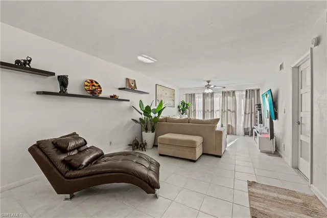 a living room with furniture and a couch