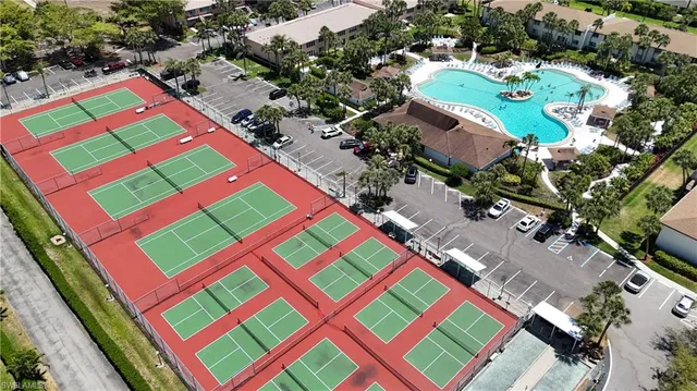an aerial view of a swimming pool and outdoor space
