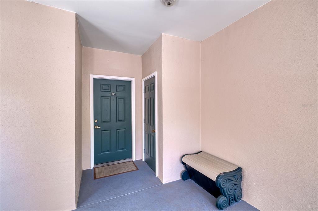 512 Water Street, Unit 512 Celebration, FL 34747 - Photo 21 of 46 a view of an empty room and room with windows