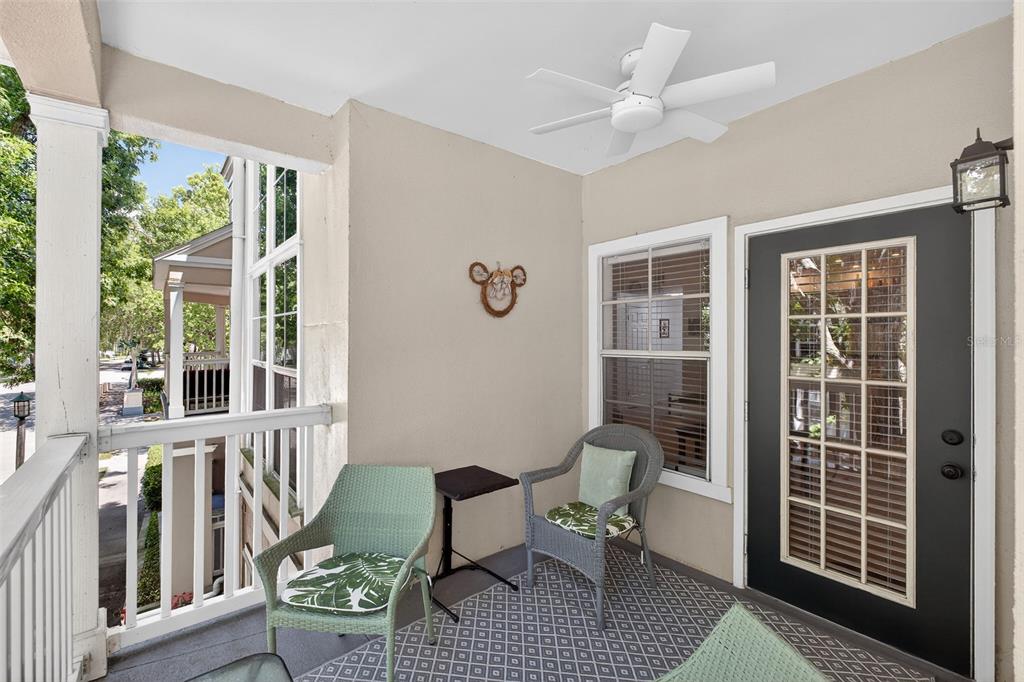 512 Water Street, Unit 512 Celebration, FL 34747 - Photo 23 of 46 a view of a livingroom with furniture and a window