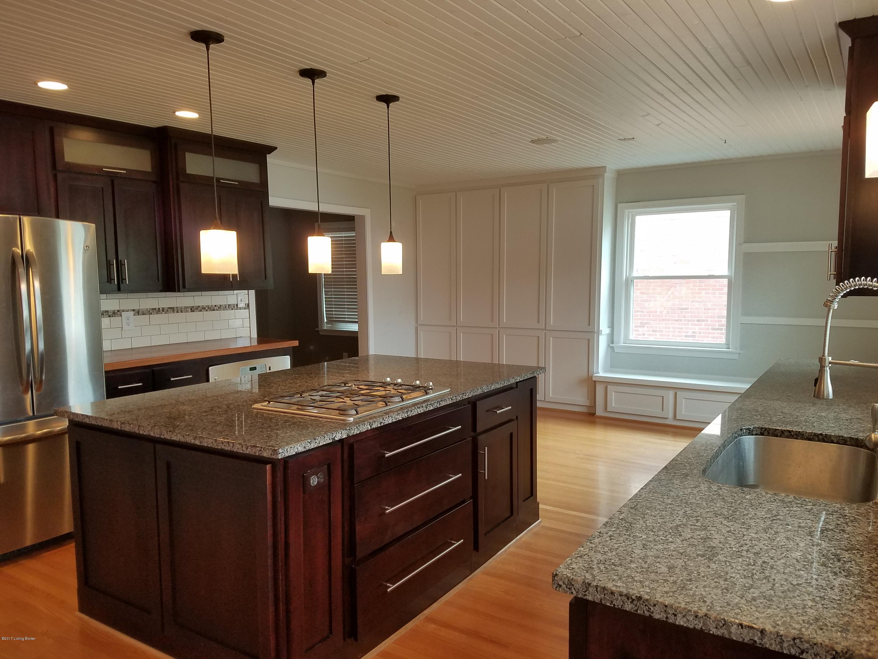 316 Sage Road Louisville, KY 40207 - Photo 6 of 28 Soft-closing drawers, beautiful granite counters, and high-end stainless steel appliances.