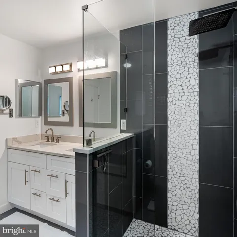 a bathroom with a bathtub and toilet