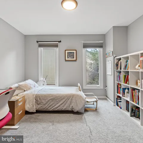 a view of livingroom with furniture and windows