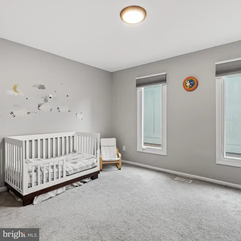 a view of a livingroom with shelves