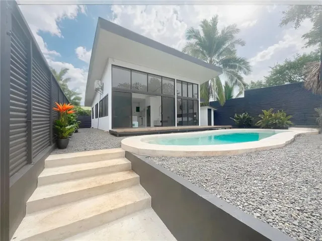 a view of a house with a swimming pool