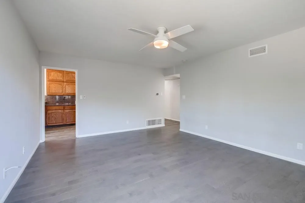 7568 Ohio Place La Mesa, CA 91942 - Photo 15 of 32 an empty room with closet and fan