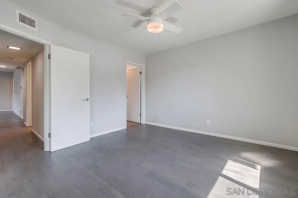 7568 Ohio Place La Mesa, CA 91942 - Photo 21 of 32 an empty room with closet area
