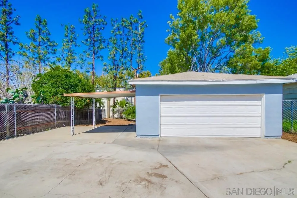7568 Ohio Place La Mesa, CA 91942 - Photo 23 of 32 front view of a house with a garage