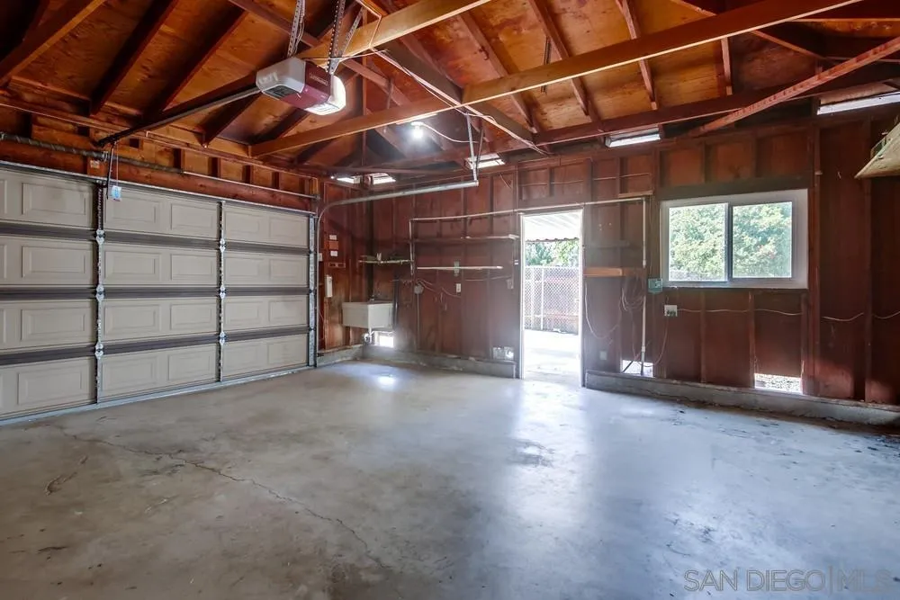 7568 Ohio Place La Mesa, CA 91942 - Photo 30 of 32 a view of empty room with wooden ceiling