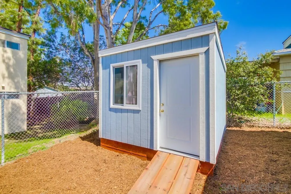 7568 Ohio Place La Mesa, CA 91942 - Photo 31 of 32 a view of a backyard with a garden