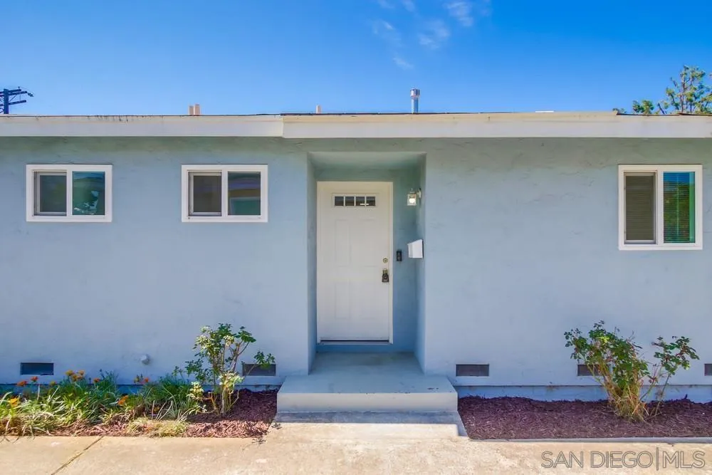 7568 Ohio Place La Mesa, CA 91942 - Photo 4 of 32 a front view of a house