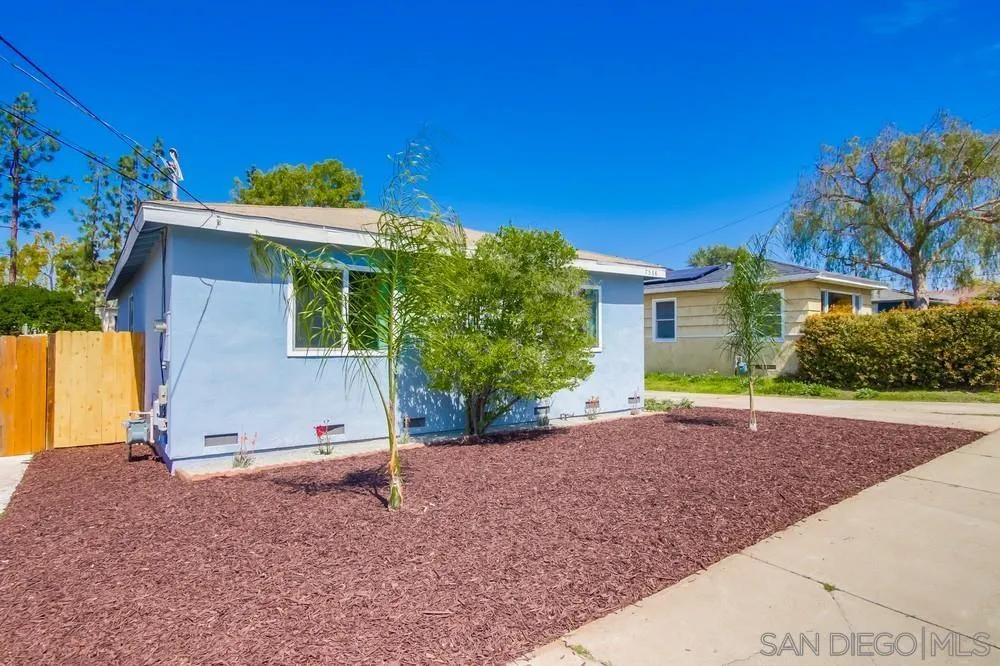 7568 Ohio Place La Mesa, CA 91942 - Photo 5 of 32 a view of a house with a yard