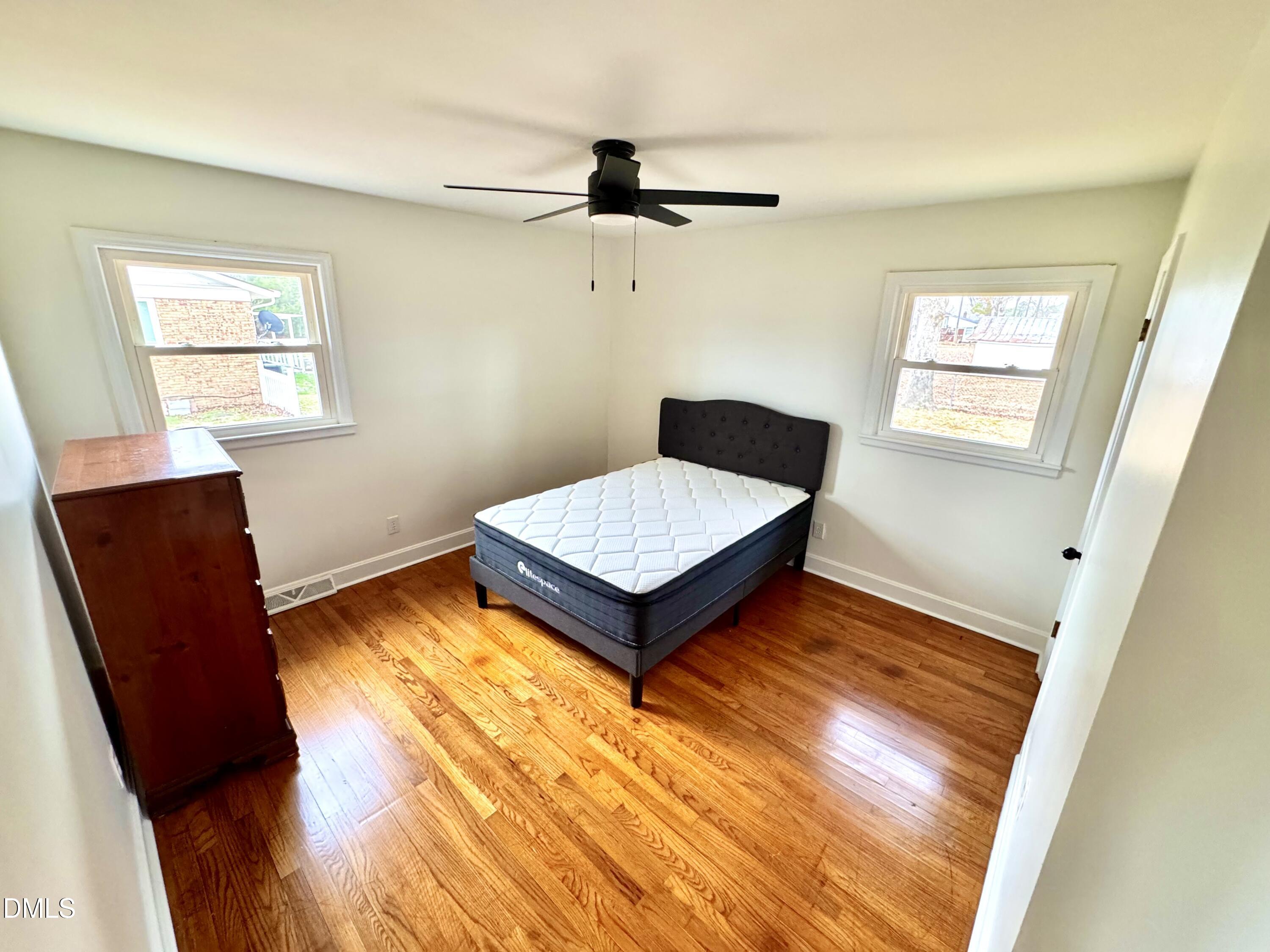 30 Nandina Drive Roxboro, NC 27573 - Photo 18 of 31 a living room with baby crib furniture and a window