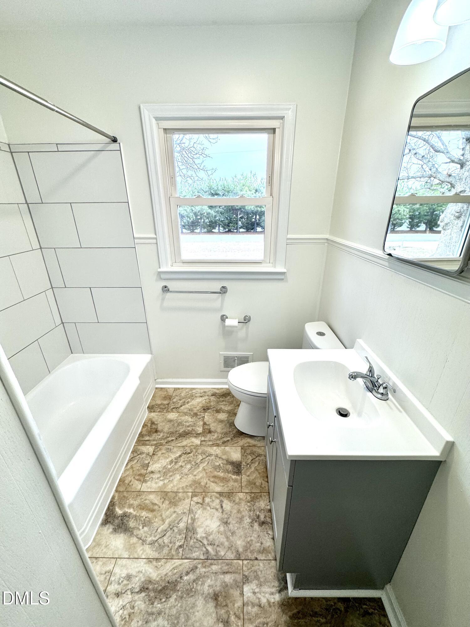 30 Nandina Drive Roxboro, NC 27573 - Photo 22 of 31 a bathroom with a sink and a bathtub