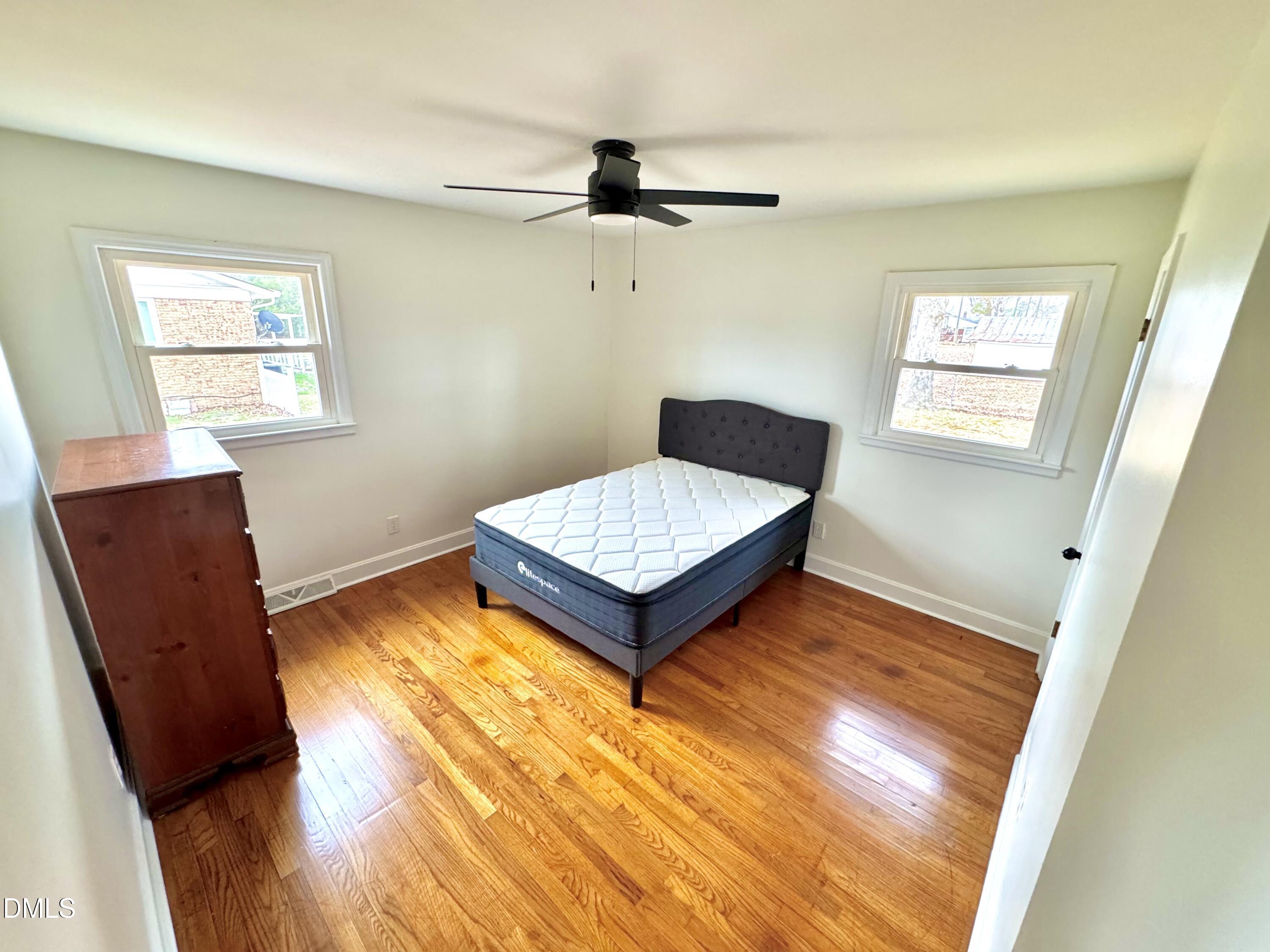 30 Nandina Drive Roxboro, NC 27573 - Photo 25 of 31 a living room with baby crib furniture and a window