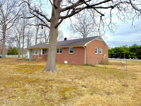 a bathroom with a sink and a yard