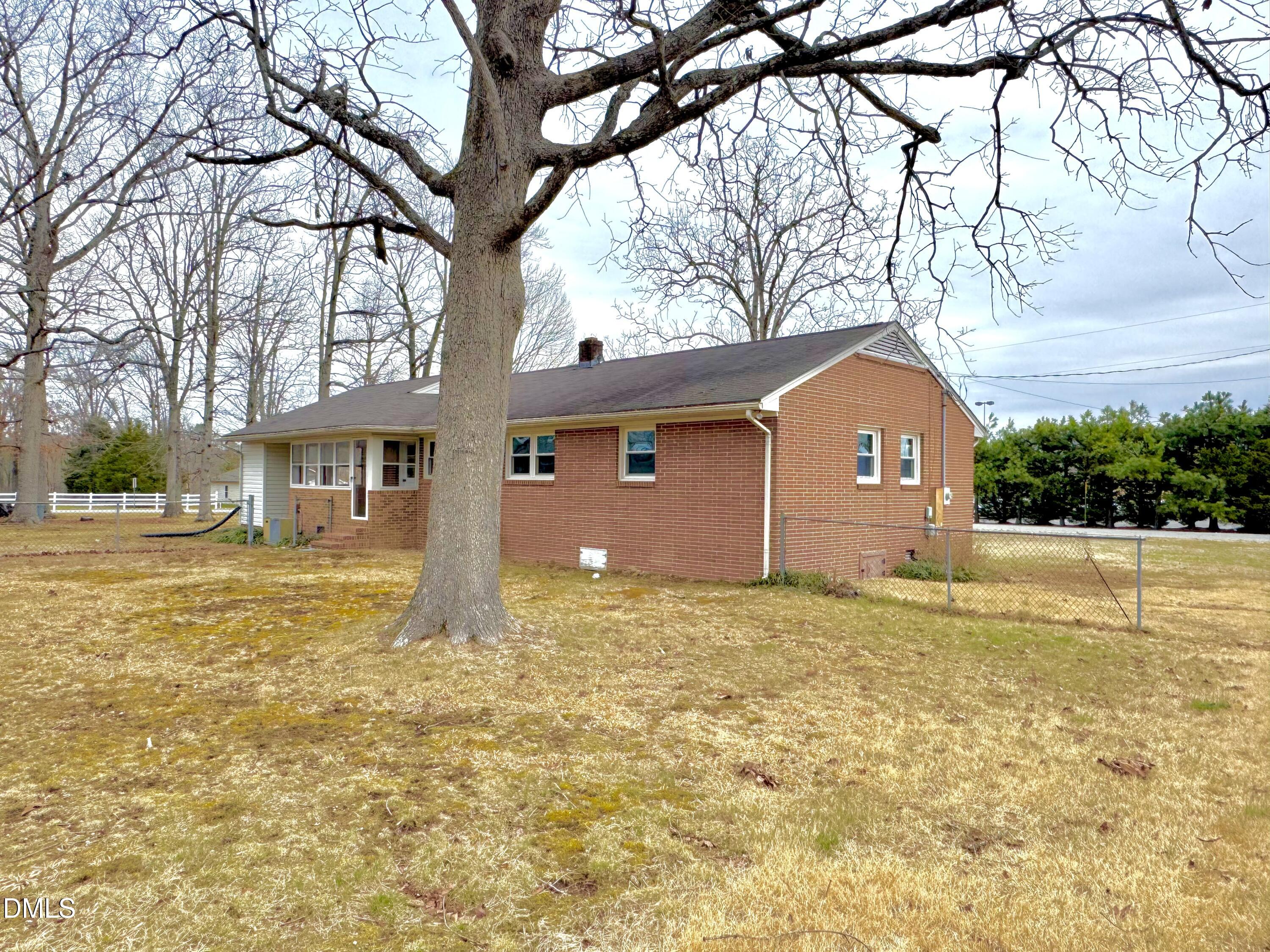 30 Nandina Drive Roxboro, NC 27573 - Photo 27 of 31 a bathroom with a sink and a yard