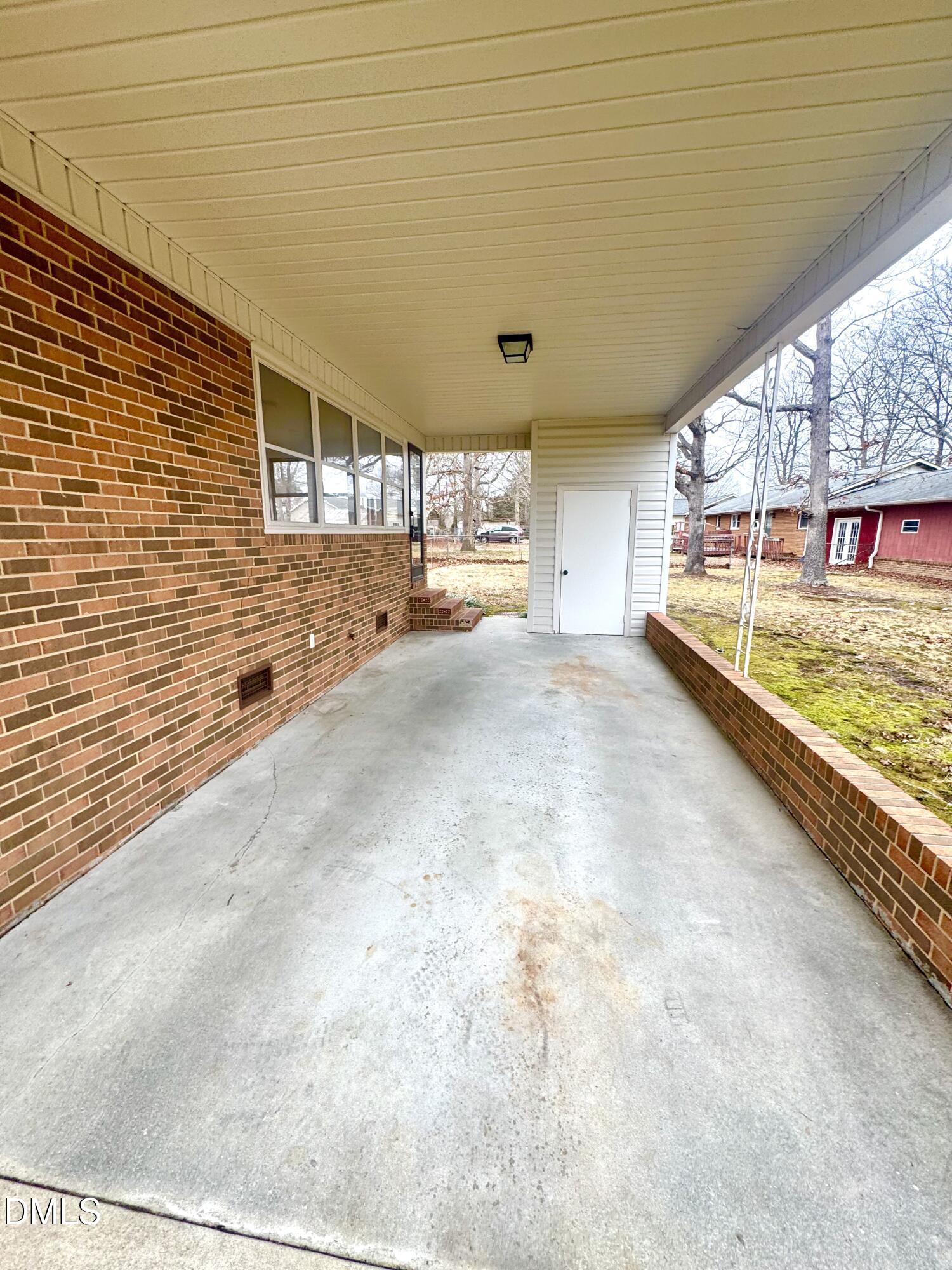 30 Nandina Drive Roxboro, NC 27573 - Photo 3 of 31 a view of a hallway with a large window