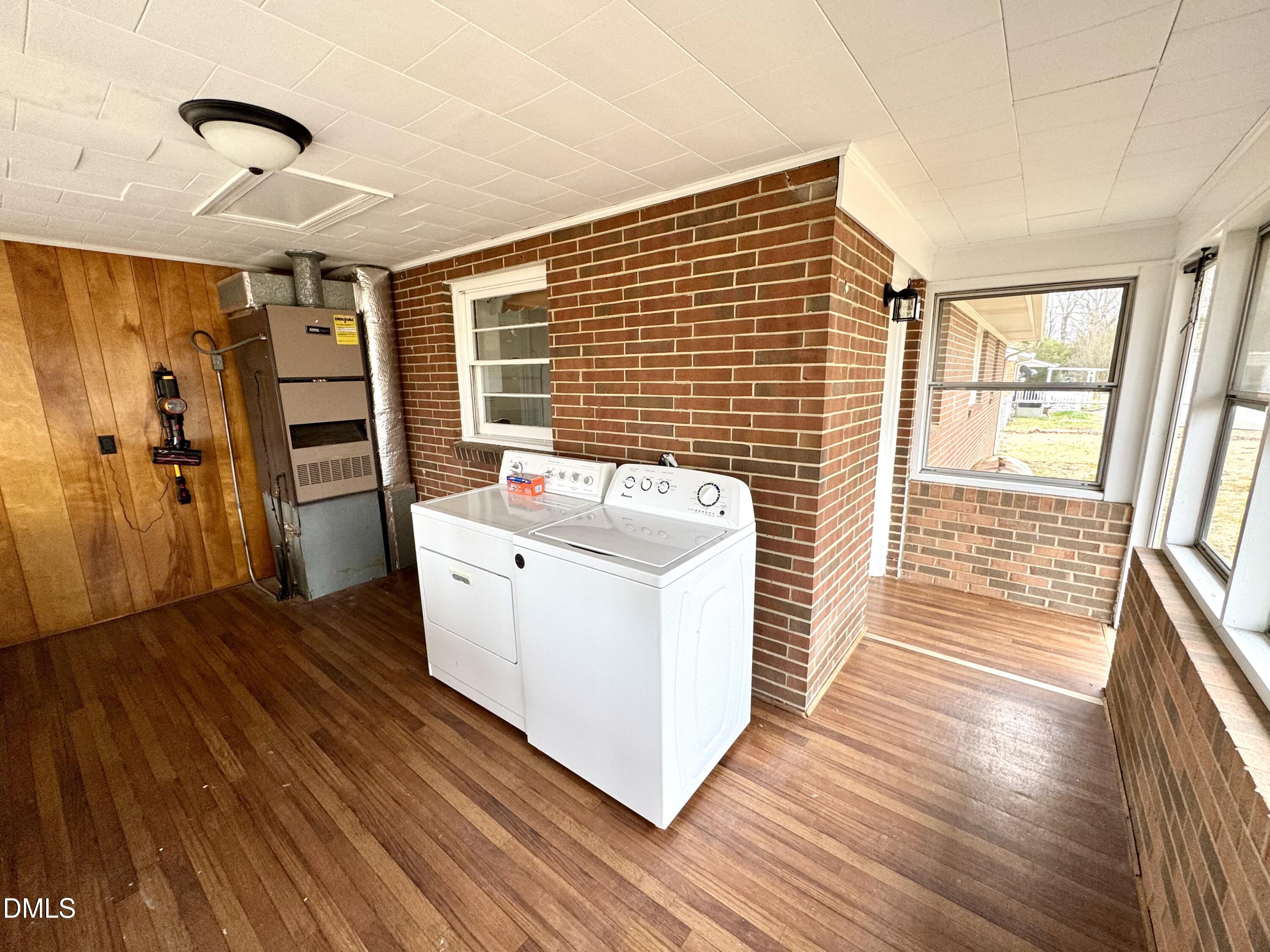 30 Nandina Drive Roxboro, NC 27573 - Photo 5 of 31 a view of a livingroom with furniture wooden floor and window