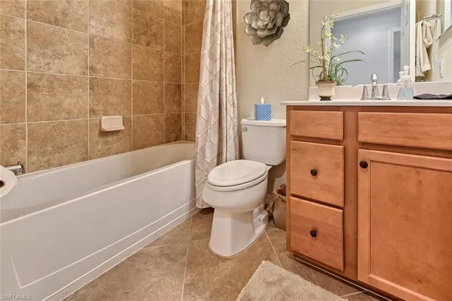 a bathroom with a toilet and a sink