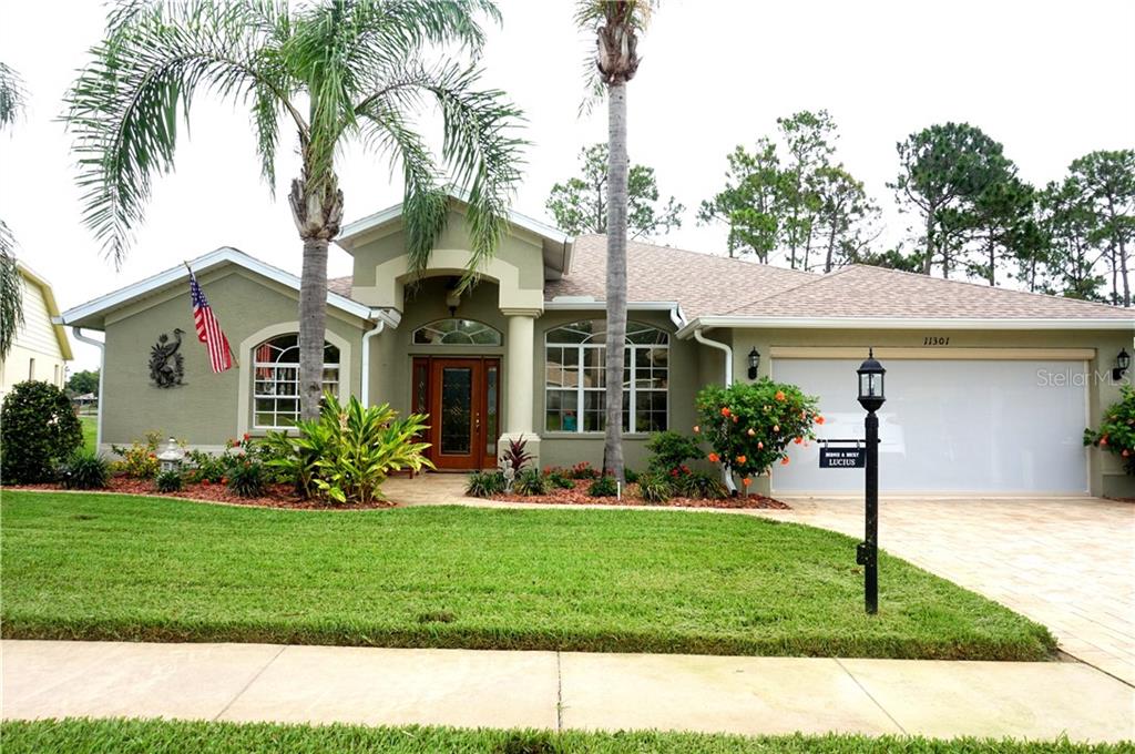 11301 Sun Tree Road Hudson, FL 34667 - Photo 1 of 1 Exterior Front