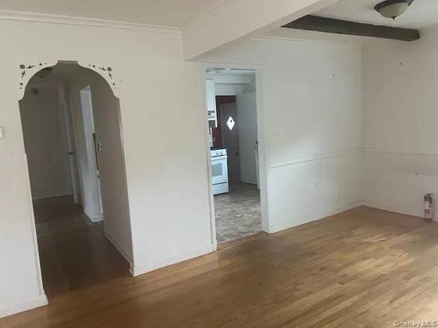 a view of a bathroom with a sink and a mirror