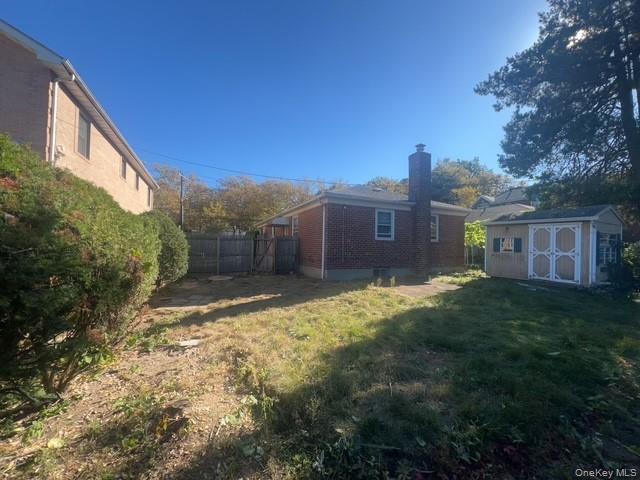 51-10 248th Street Queens, NY 11362 - Photo 8 of 8 a view of a house with a yard
