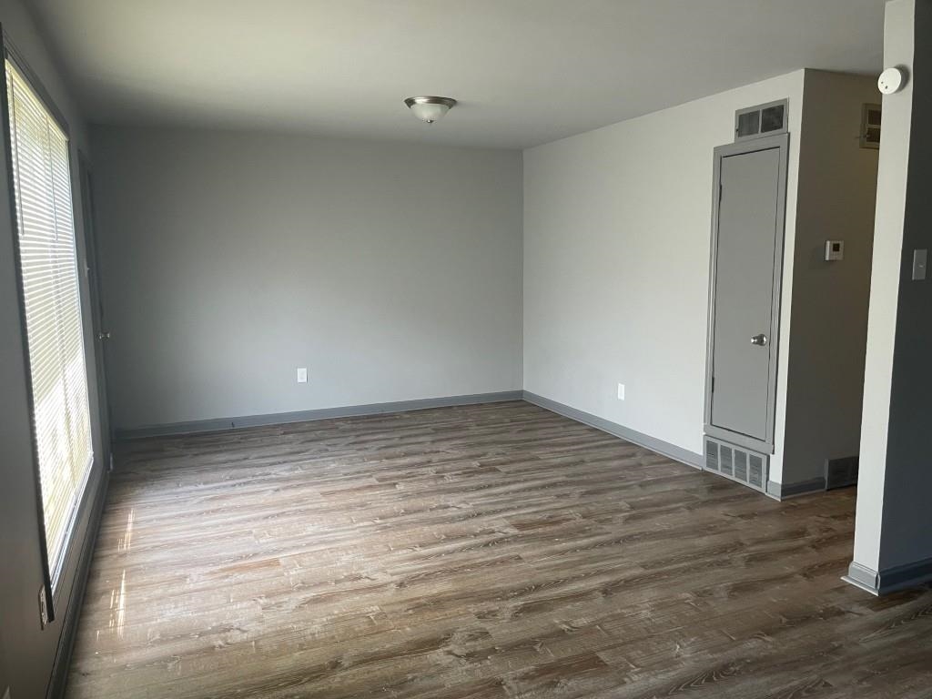 356 Delta Road Memphis, TN 38109 - Photo 5 of 12 a view of an empty room and window