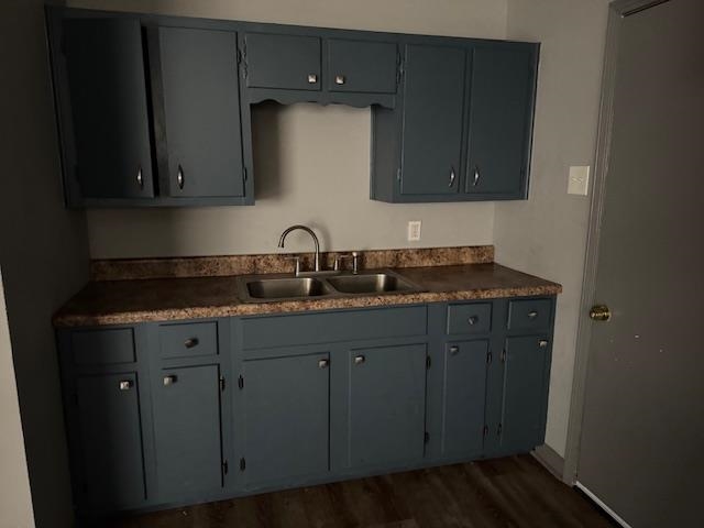 356 Delta Road Memphis, TN 38109 - Photo 6 of 12 a kitchen with granite countertop wood cabinets