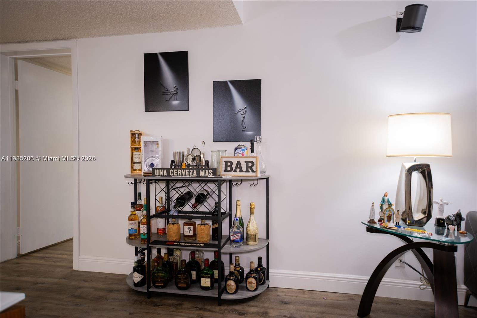 16100 Golf Club Road, Unit 202 Weston, FL 33326 - Photo 16 of 31 a view of a hallway with a workspace