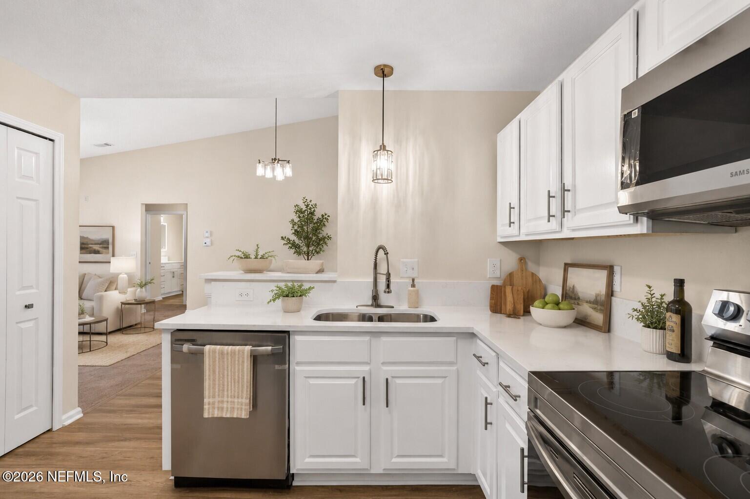 7920 Merrill Road, Unit 615 Jacksonville, FL 32277 - Photo 10 of 27 Virtualy Staged Kitchen.