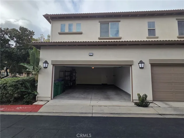 a view of a house with a street