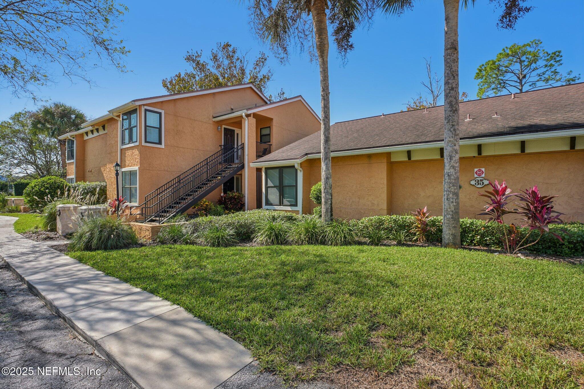 930 Seashell Lane Ponte Vedra Beach, FL 32082 - Photo 1 of 29 a view of a house with a yard