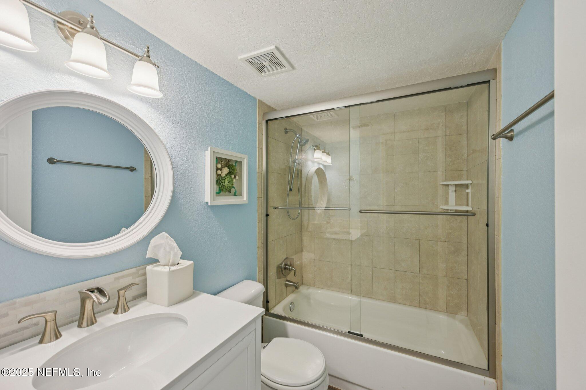 930 Seashell Lane Ponte Vedra Beach, FL 32082 - Photo 18 of 29 a bathroom with a sink toilet and shower