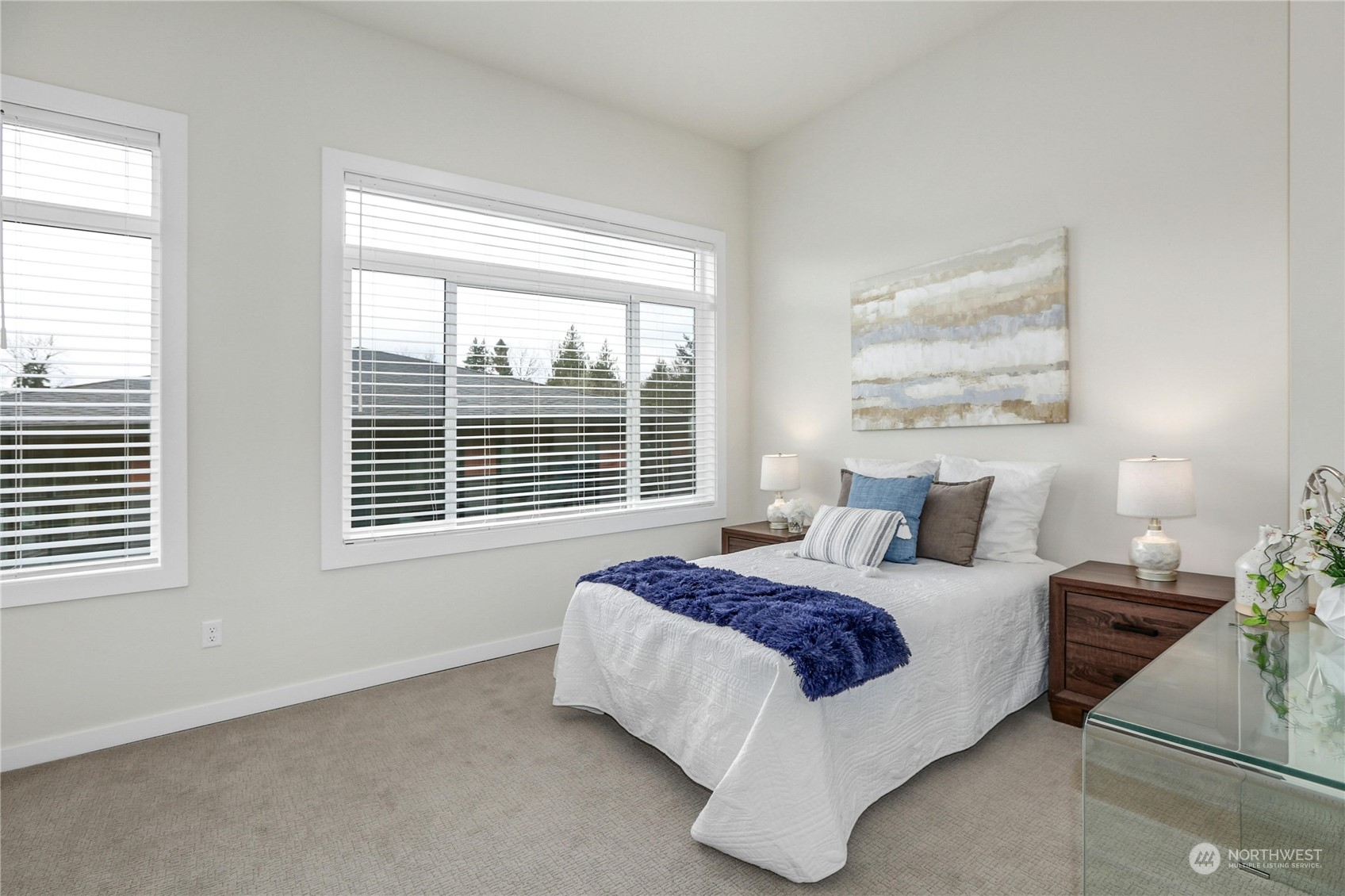 14493 Cedar Grove Road Southeast, Unit D101 Issaquah, WA 98027 - Photo 15 of 22 a spacious bedroom with a bed and a window