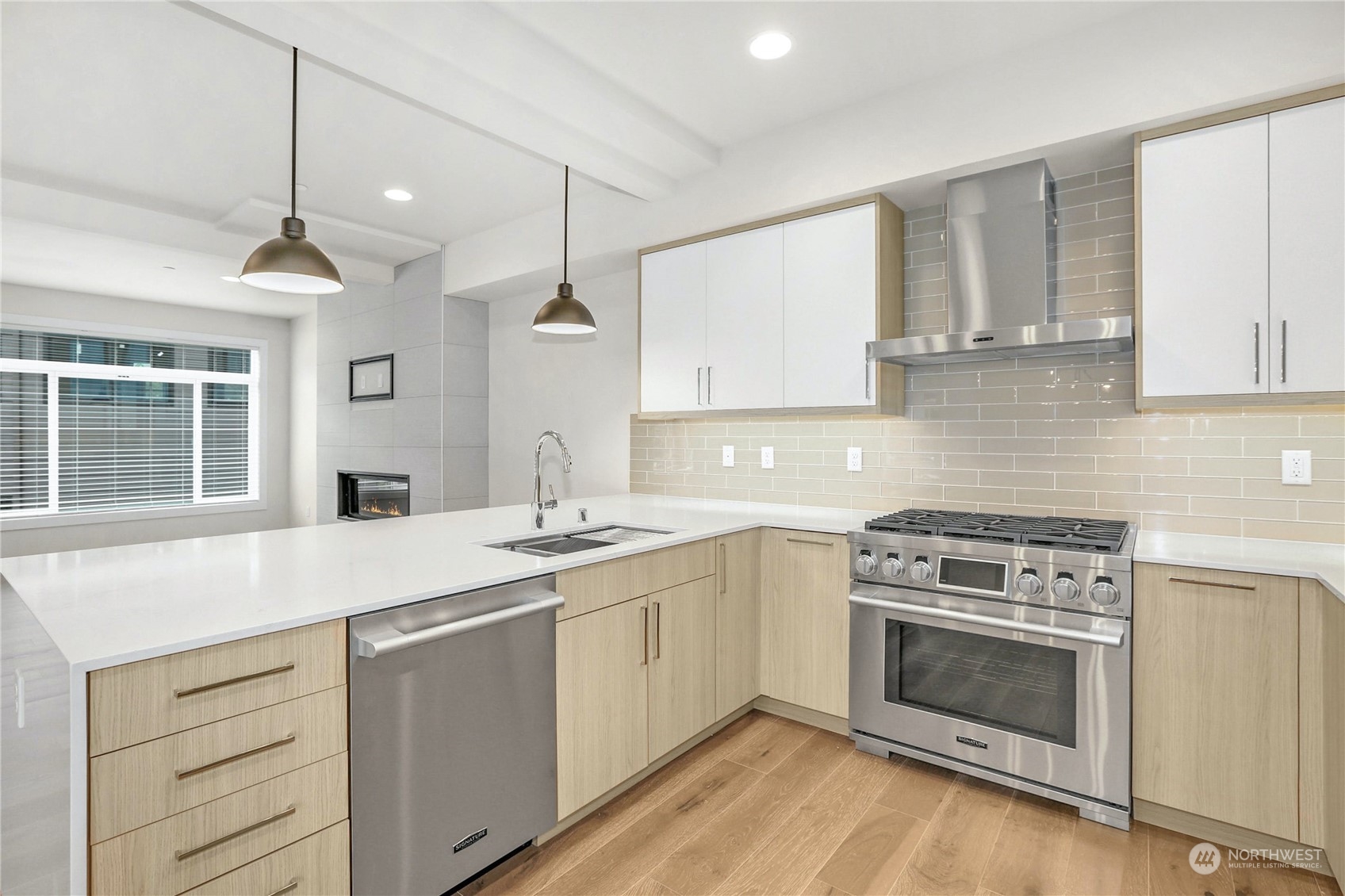 14493 Cedar Grove Road Southeast, Unit D101 Issaquah, WA 98027 - Photo 8 of 22 a kitchen with a stove oven and sink