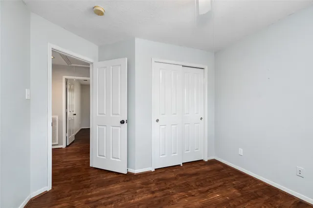 a view of a livingroom with wooden floor