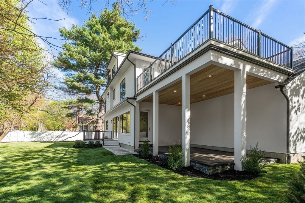 470 Quinobequin Road Newton, MA 02468 - Photo 34 of 37 a view of a house with a yard