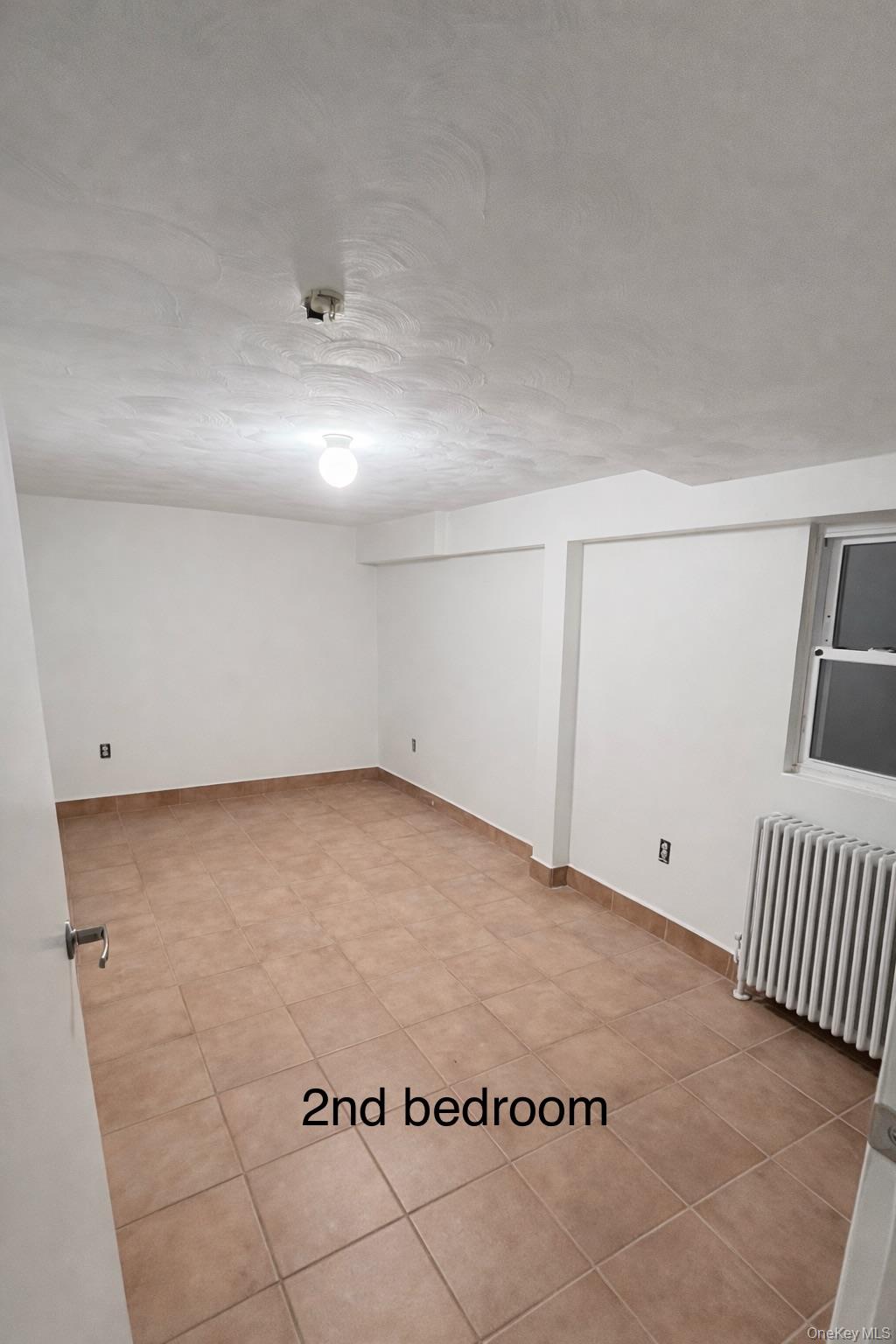 278 Mile Square Road Yonkers, NY 10701 - Photo 6 of 8 a view of an empty room