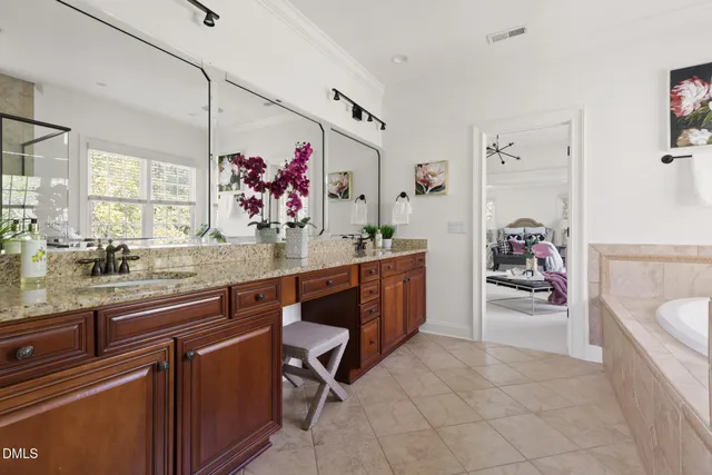 a kitchen with stainless steel appliances a sink and cabinets