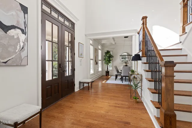 a view of living room with furniture and wooden floor