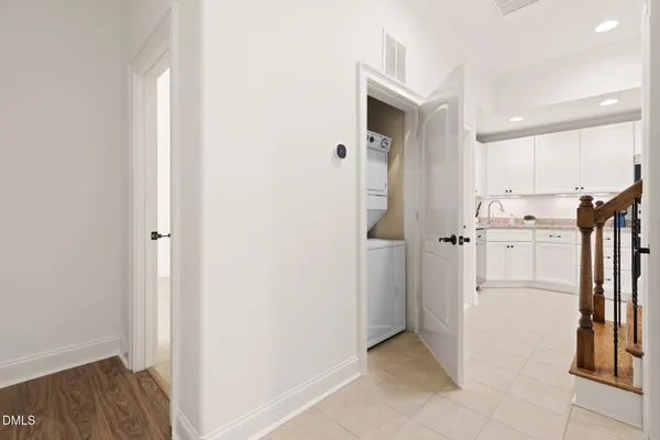 a view of a kitchen from the hallway