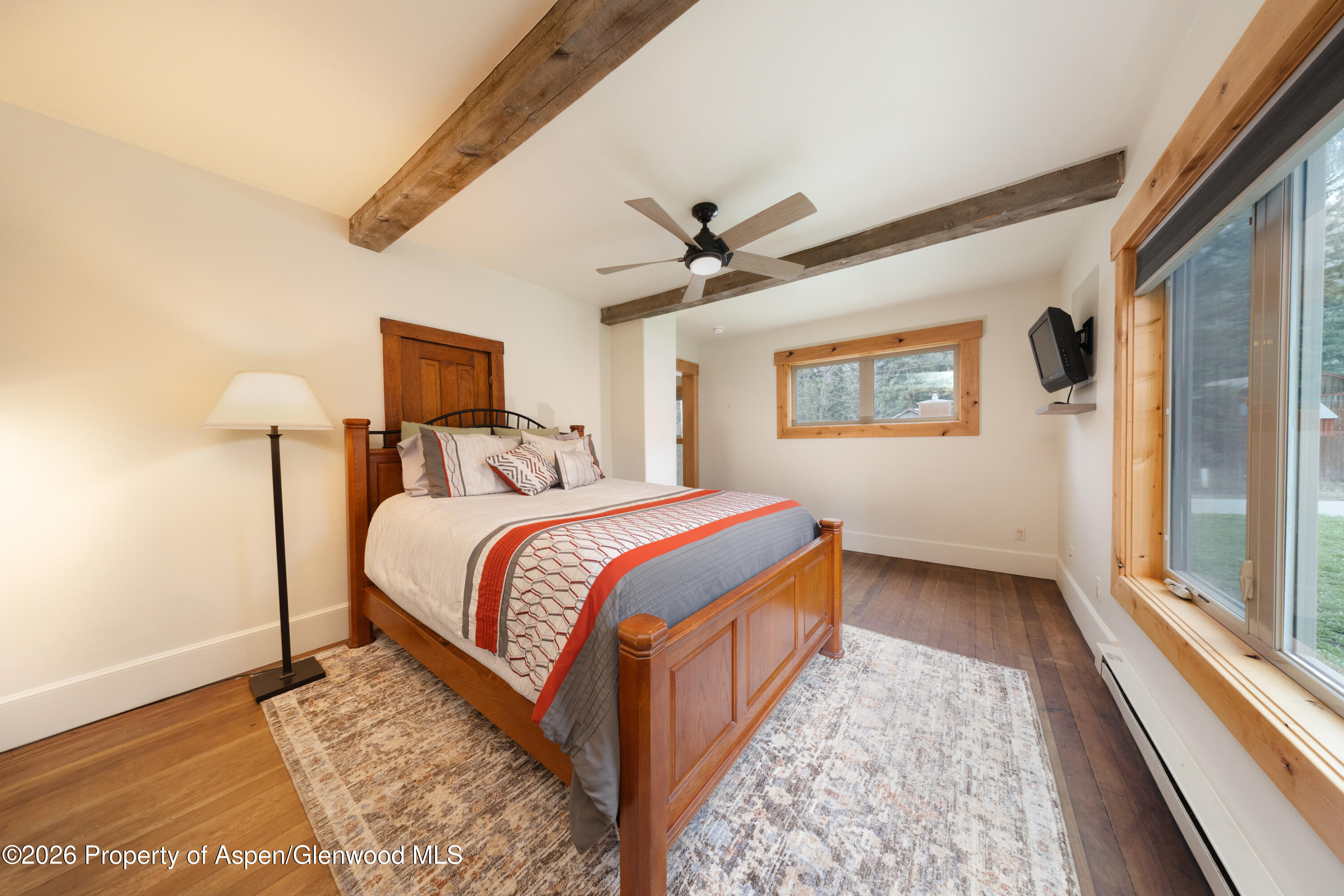 113 West State Street Marble, CO 81623 - Photo 12 of 44 a bedroom with bed and a large window