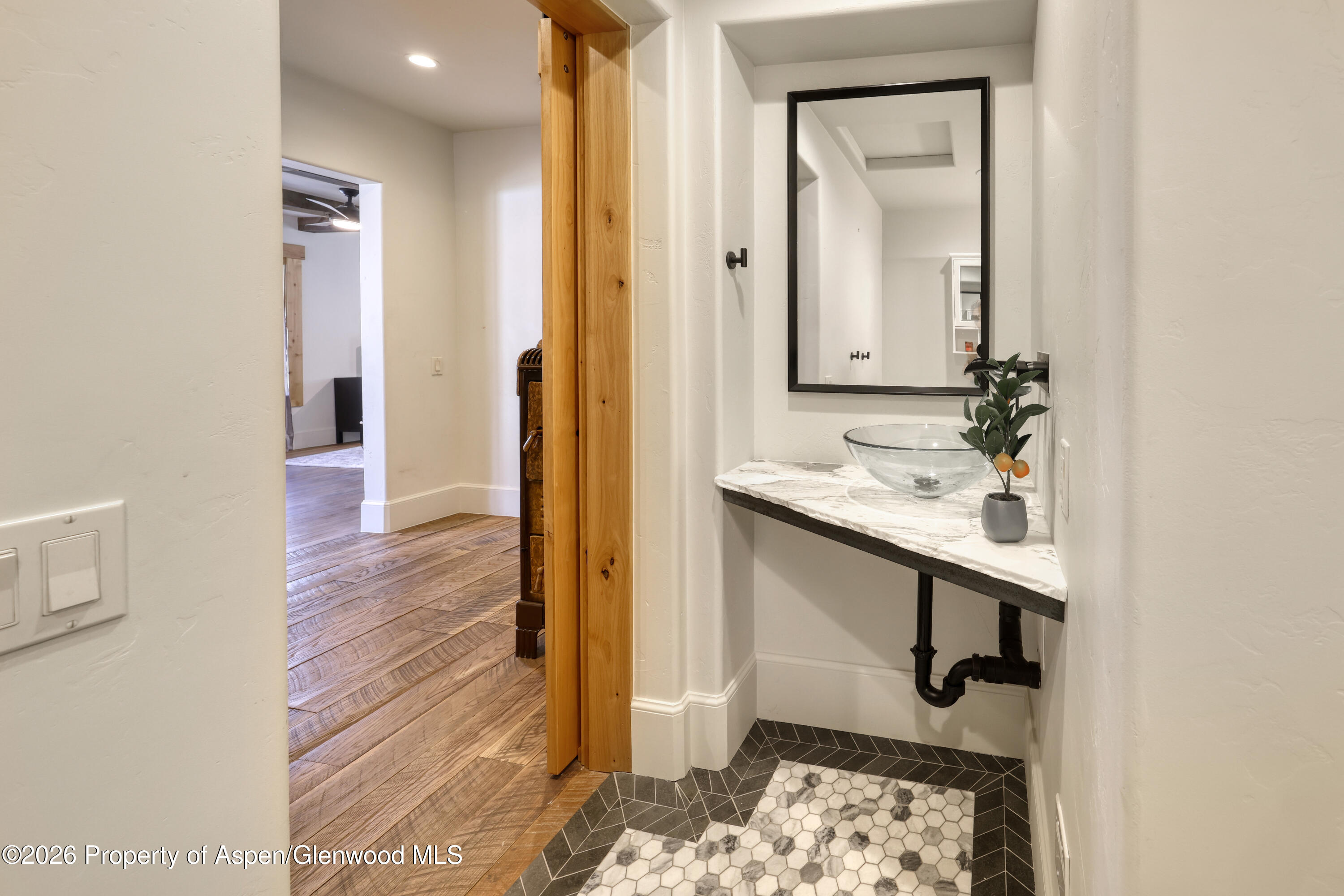 113 West State Street Marble, CO 81623 - Photo 16 of 44 a bathroom with a sink and a mirror