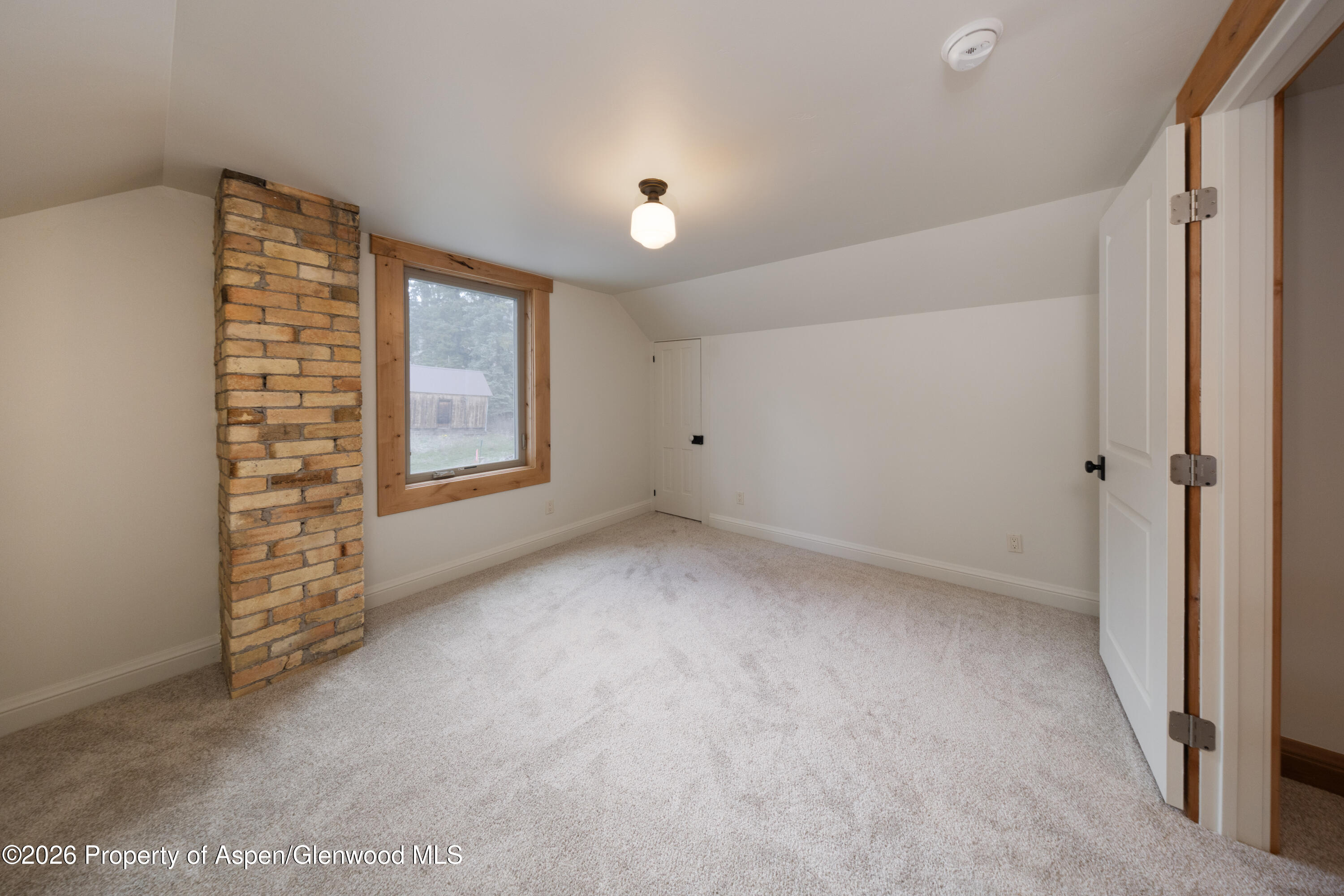 113 West State Street Marble, CO 81623 - Photo 24 of 44 a view of an empty room with a window