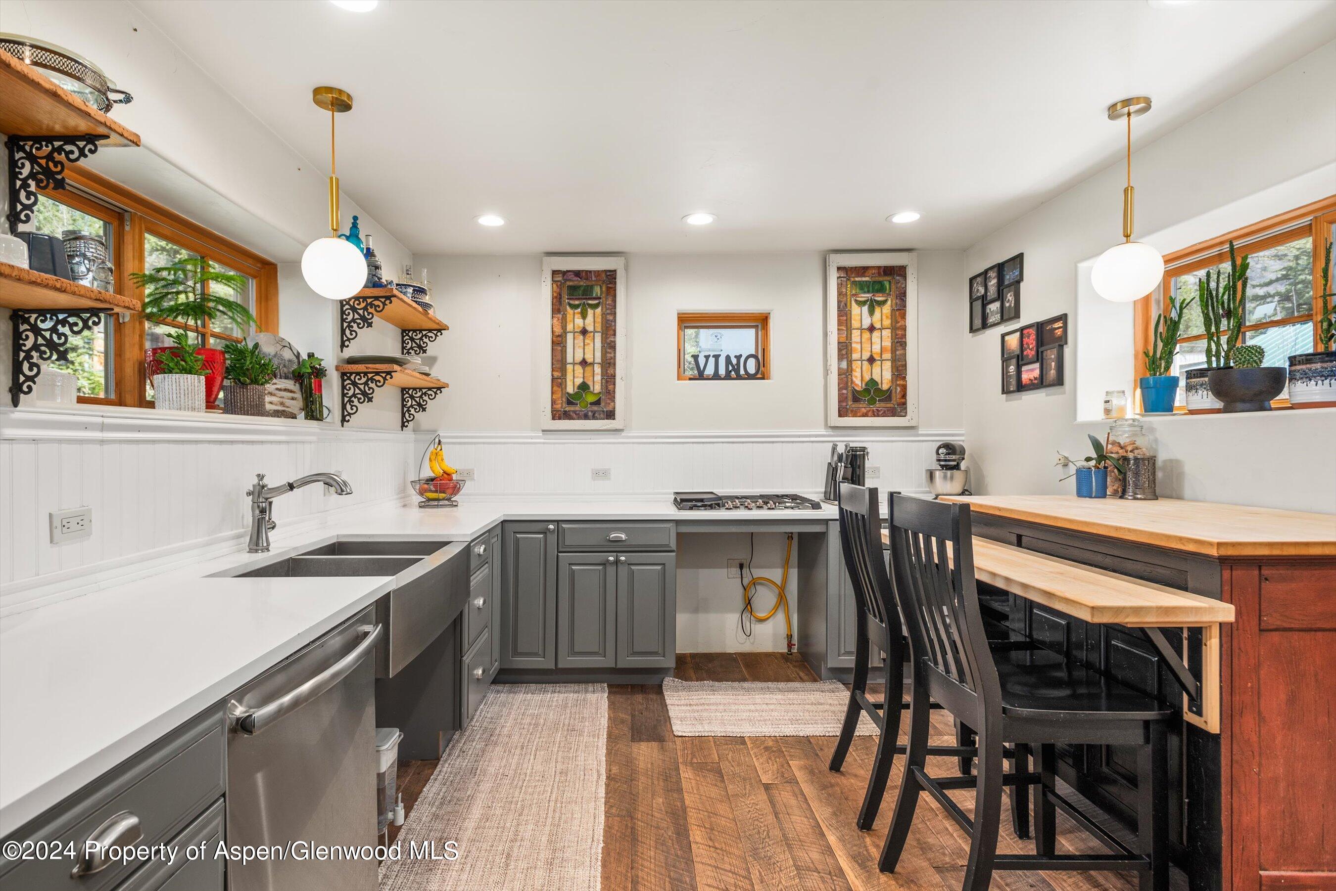 113 West State Street Marble, CO 81623 - Photo 7 of 44 a kitchen with a table chairs sink and cabinets