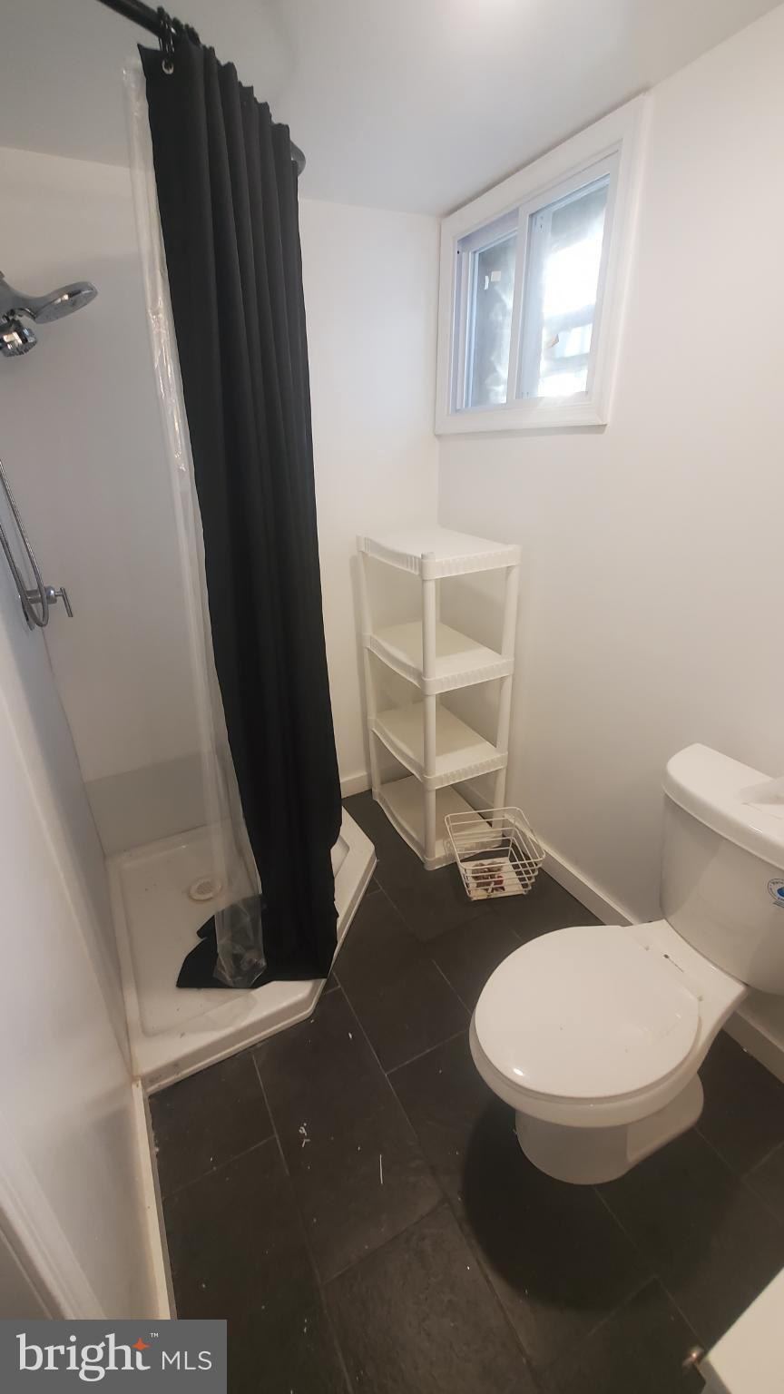 7311 North 21st Street Philadelphia, PA 19138 - Photo 13 of 15 Full basement bathroom