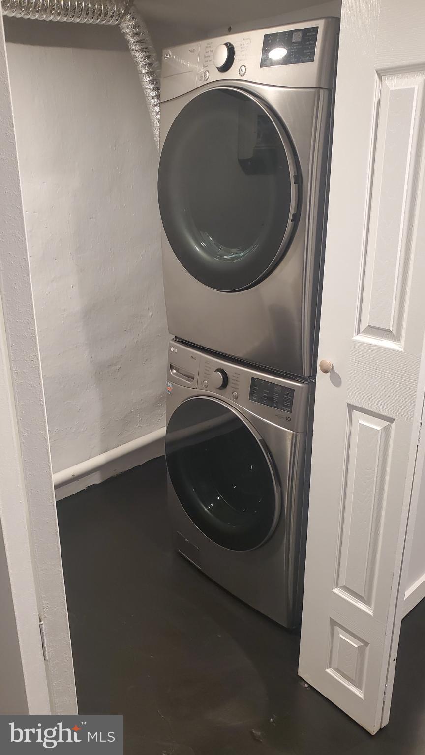 7311 North 21st Street Philadelphia, PA 19138 - Photo 14 of 15 Sleek laundry setup in a modern space.